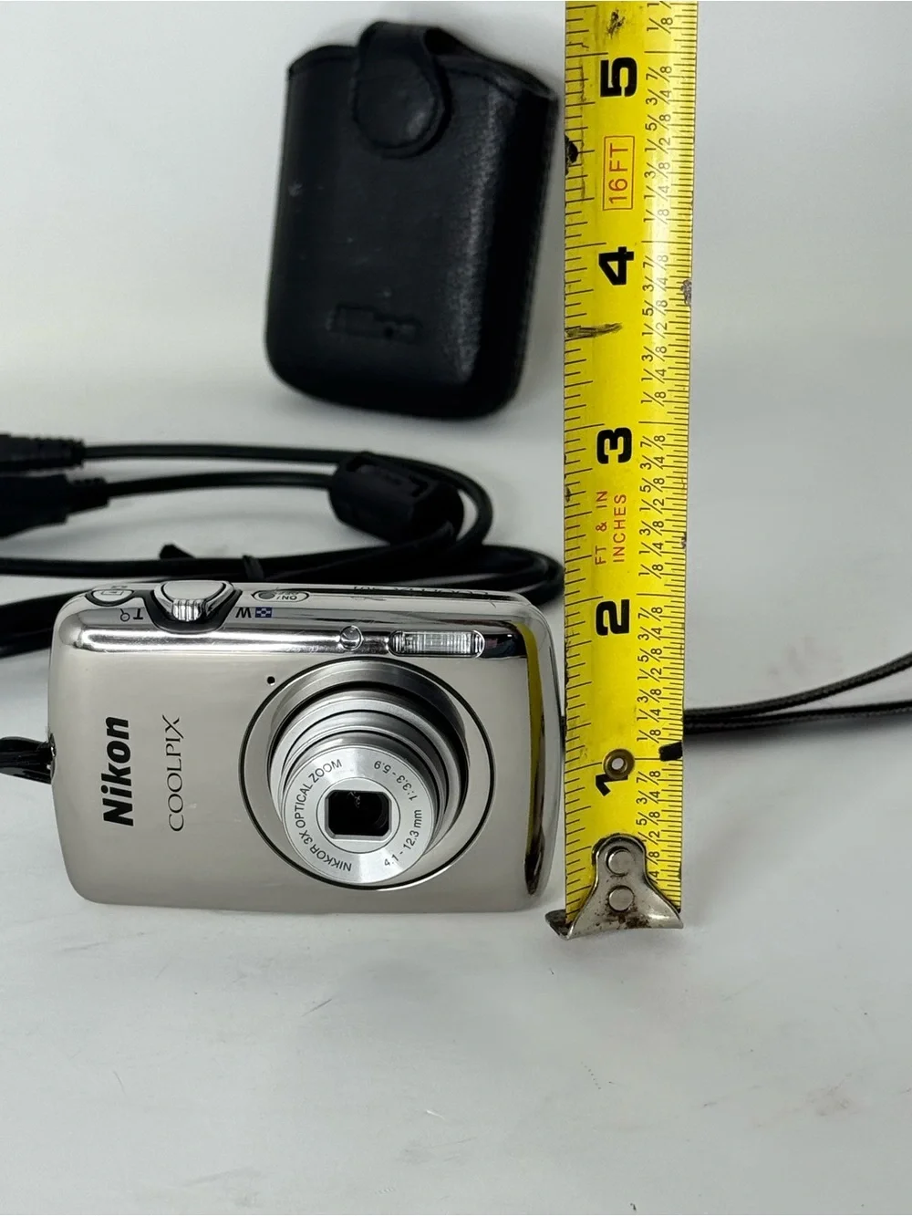 Nikon COOLPIX Silver Point-and-Shoot Camera with Black Case with charger cable